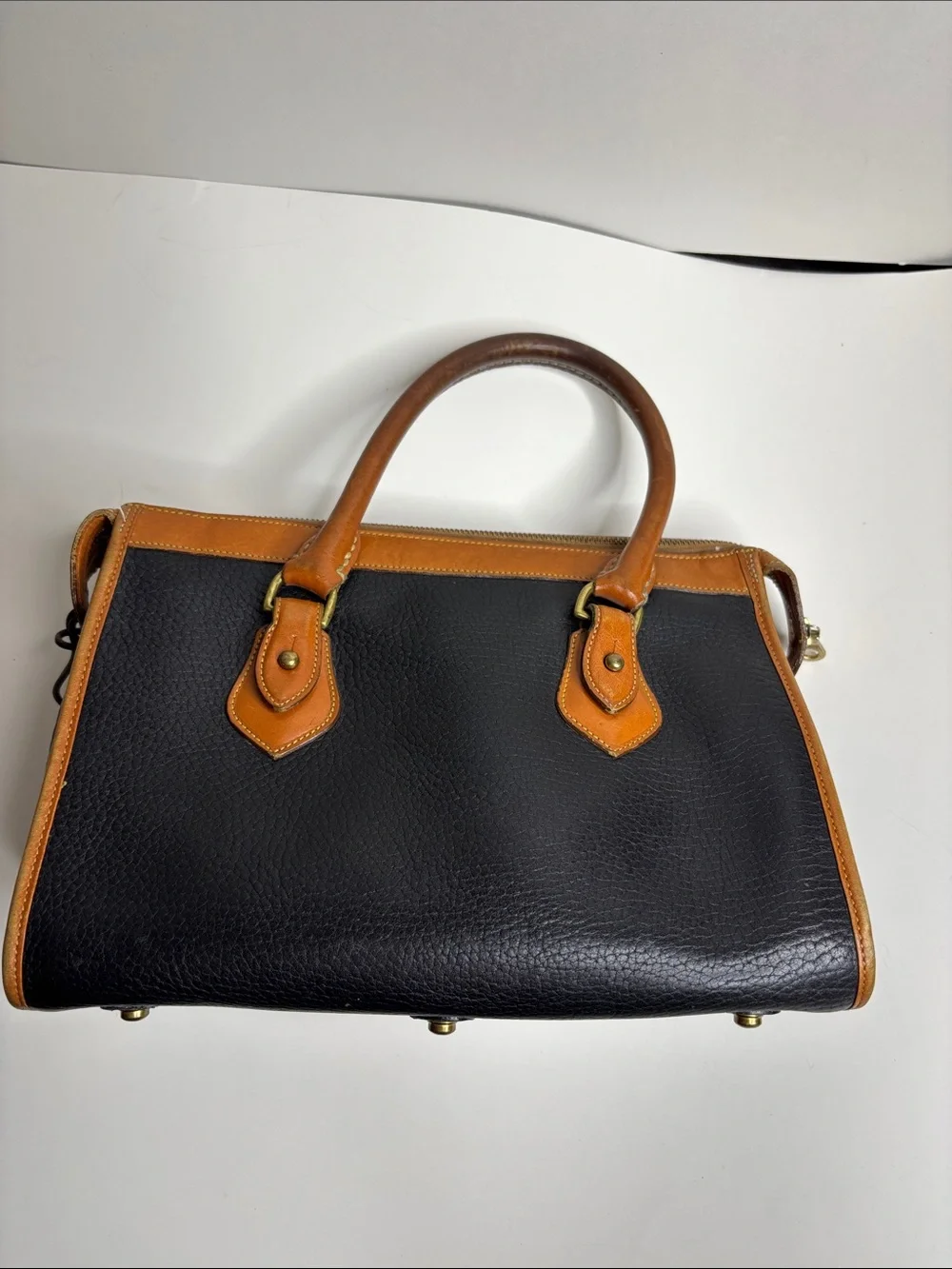 Dooney & Bourke Black Pebbled Leather Satchel with Tan Trim